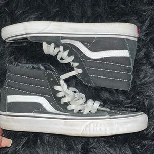 BLACK AND WHITE HIGH TOP VANS